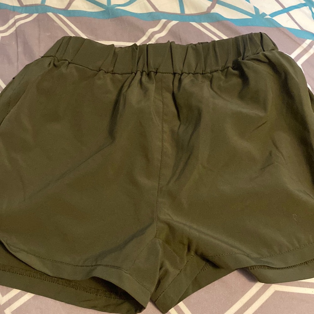 green shorts